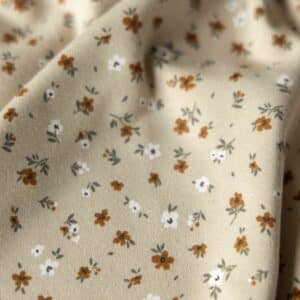 Jersey kleine bloemen beige