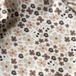 Jersey nude bloemen offwhite