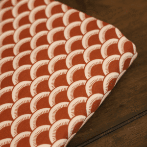 Coupon 150cm tricot grafisch roestbruin