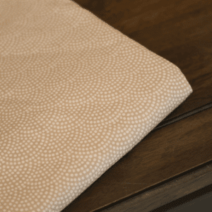 Coupon 150cm tricot grafisch beige