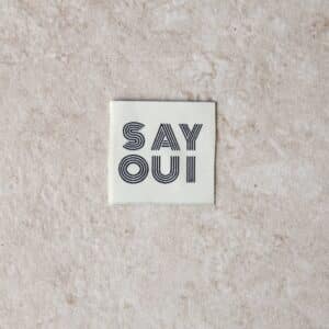 Van schie raamdecoratie & stoffen 11 Loop&label - say oui - medium label