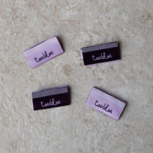 Van schie raamdecoratie & stoffen 5 Loop&label - toedeloe paars/lila - zijnaadlabels (4 stuks)