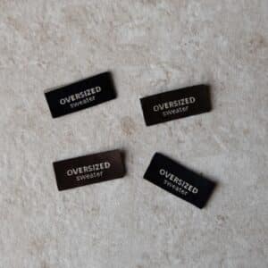 Van schie raamdecoratie & stoffen 3 Loop&label - oversized sweater bruin/zwart - zijnaadlabels (4 stuks)