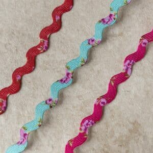 Van schie raamdecoratie & stoffen 2 Zigzagband bloemen 5mm