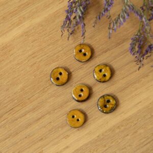 Parelmoer knoop 10mm oker