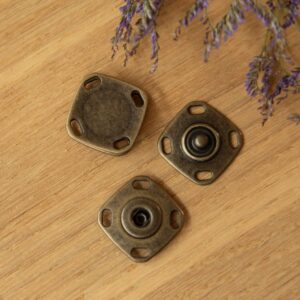 Drukknoop aannaaibaar 22mm brons